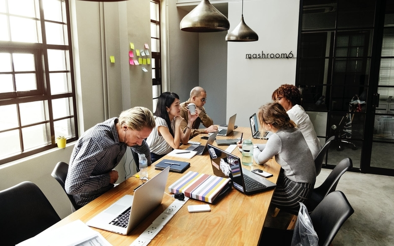 Image of people in a meeting together